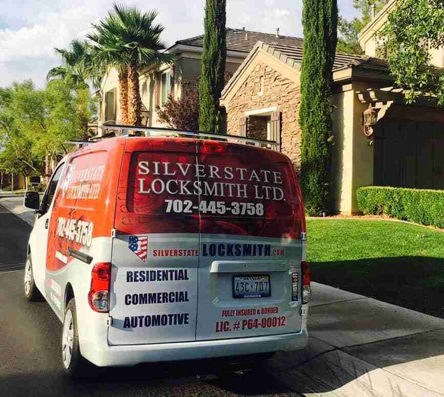 Silver State Locksmith residential technician rekeying a door lock