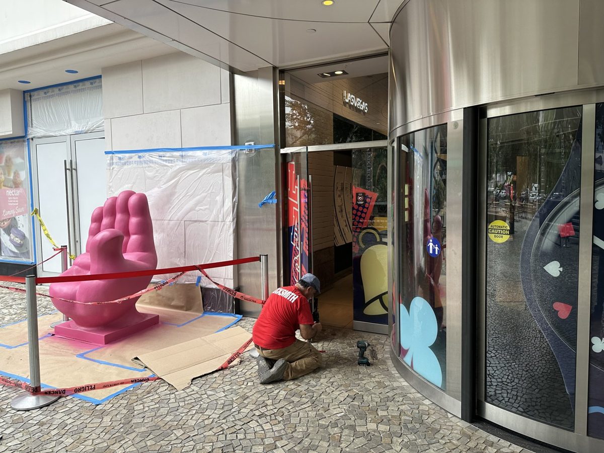 Silver State Locksmith technician repairing a storefront door on the Las Vegas Strip
